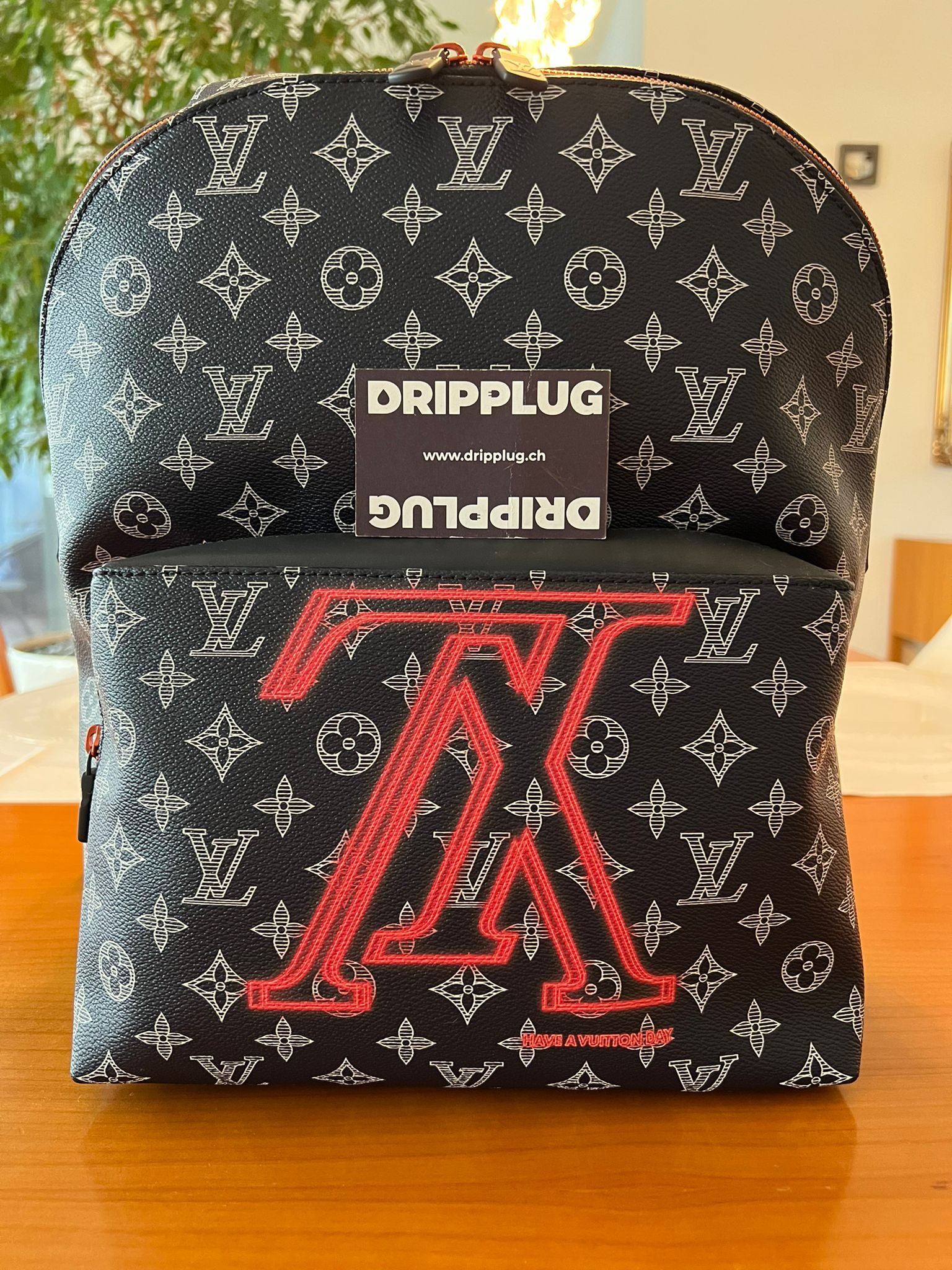 LOUIS VUITTON ‘Discovery’ Backpack Monogram Ink Upside Down